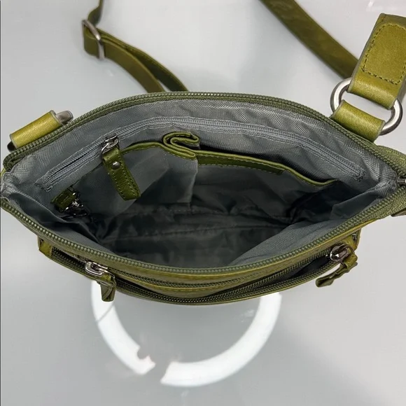Osgoode Marley olive leather crossbody bag w tons of storage